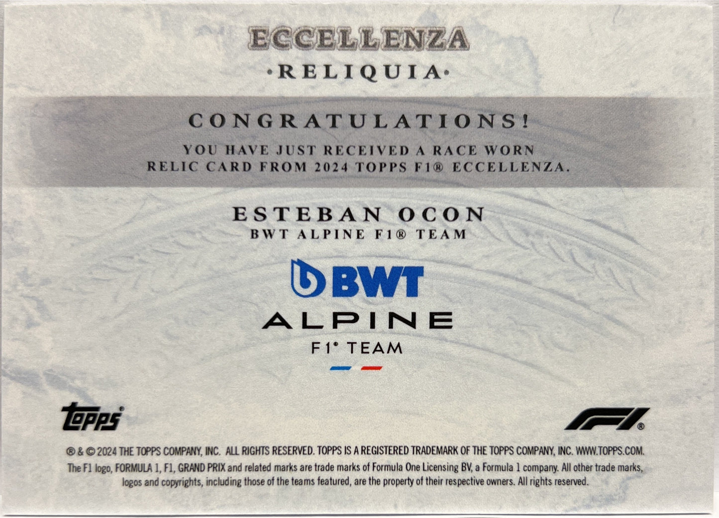 Esteban Ocon Patch Reliquia Topps Eccellenza F1 2024