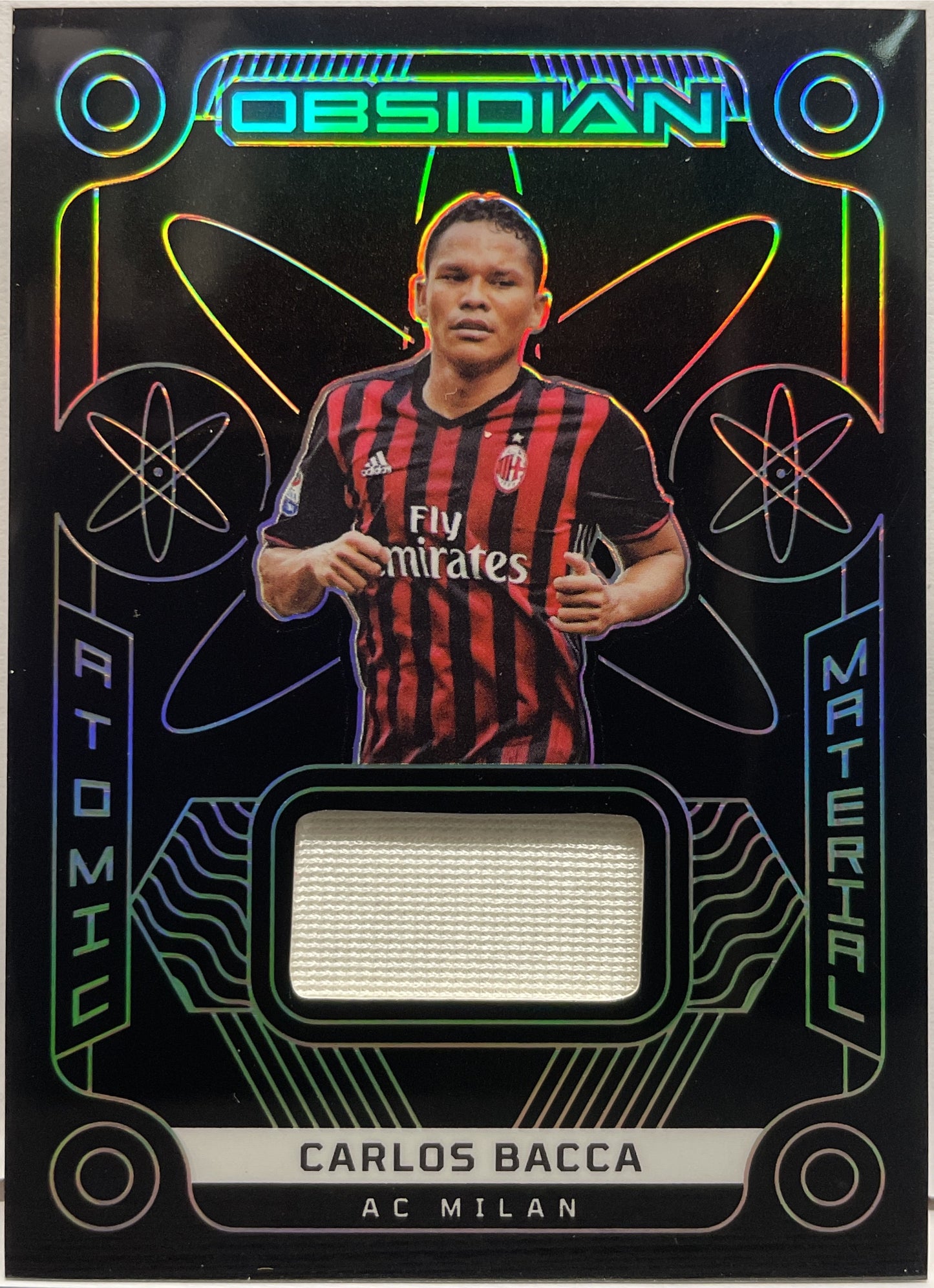 Carlos Bacca 33/199 Patch Atomic Material Obsidian 2022/23