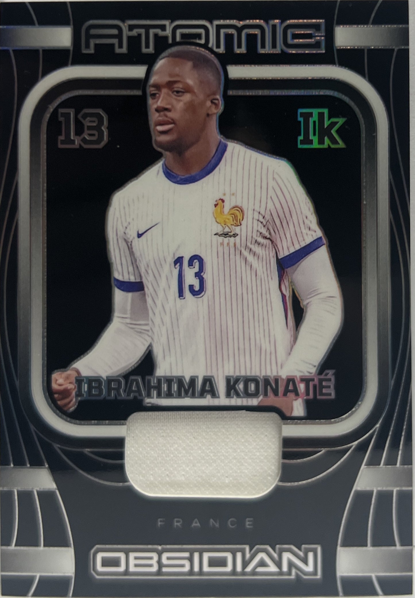 Ibrahima Konate 124/199 Patch Atomic Obsidian 2023/24